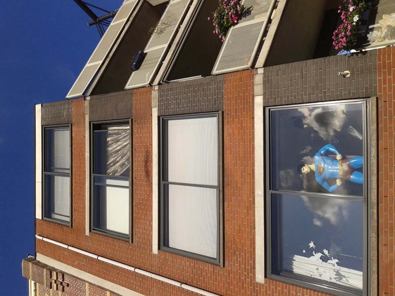 Joanna Gaines' $30 rattan planter is a stylish means for moving your front porch decor from summer...