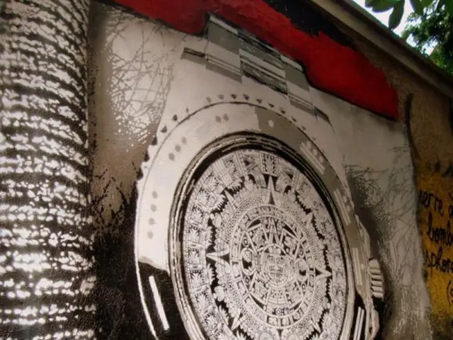 Restoring a timepiece's face with a paint roller to give it a fresh appearance