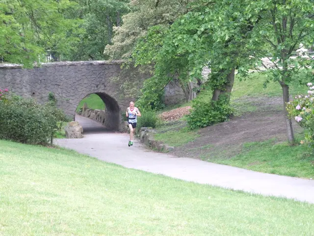 Daring Individual in Swim Attire Sprinting across Asphalt Near Highway A61