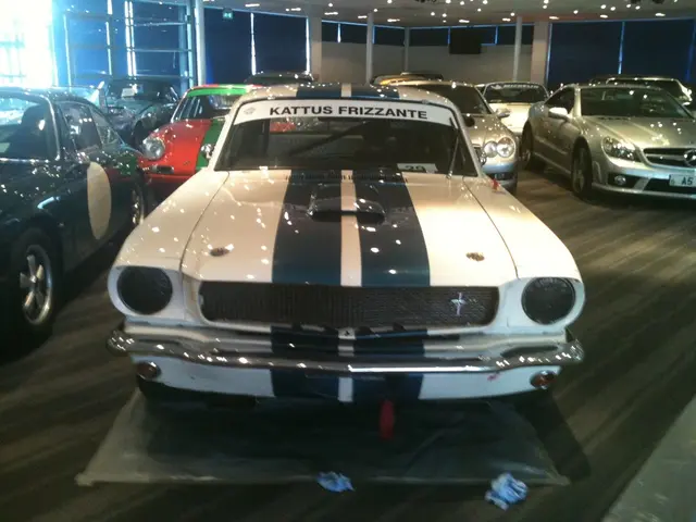 Here we can see vehicles on this surface. Top of the image there are lights.